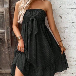 Two white blouses and one black dress
